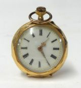 An antique ladies 18ct  gold small fob watch with keyless movement and enamelled dial set with roman