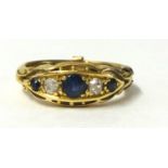 A 18ct sapphire and diamond ring, ring size L