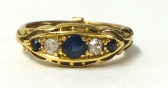 A 18ct sapphire and diamond ring, ring size L