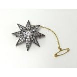 A fine antique diamond set Star Brooch, width 35mm, weight 6.20g.