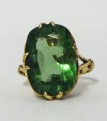 An 18ct gold ring set with large green stone, size I.