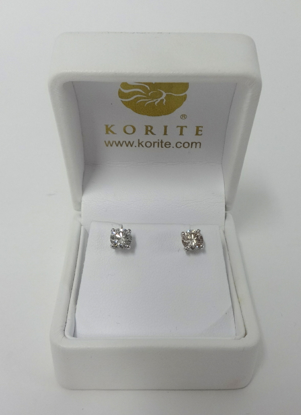 A pair of 18ct white gold diamond stud earrings, approx. 1.50 carats.