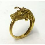 An 18ct Unicorn ring set with diamond eyes. Size L.
