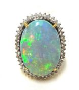 An fine 18ct gold opal and diamond cluster ring, size O.