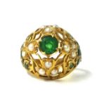 A 1970's emerald and pearl set 'Princess' ring in filigree yellow metal (gold) setting, purchased in