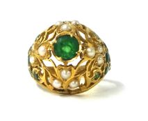 A 1970's emerald and pearl set 'Princess' ring in filigree yellow metal (gold) setting, purchased in