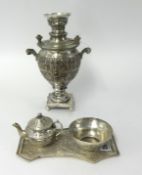 A small middle eastern white metal samovar set including tray, teapot and bowl, height 27cm.