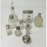 Ten various silver topped bottles (10).