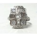 A fine 18ct white gold diamond cluster ring, size M.