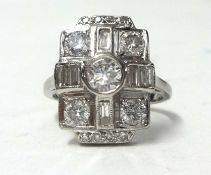 A fine 18ct white gold diamond cluster ring, size M.