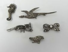 A silver sea horse brooch, a silver pheasant broch and three other brooches (5).