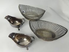 A pair of silver plated wire work oval table baskets, length 28cm, also a pair of 'Alpha' silver