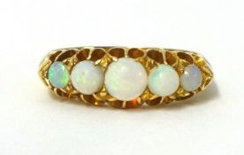 An 18ct gold five stone opal ring.