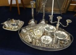 A pair of silver plated candlesticks, (drilled for electric), also a quantity of various silver