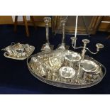 A pair of silver plated candlesticks, (drilled for electric), also a quantity of various silver