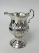 A Geo II silver cream jug, weight 73g.