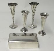 A pair of silver writhen twist spill vases, also a pair of hammered silver spill vases and a
