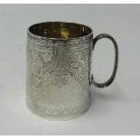 A silver christening mug with engraved leaf decoration and monogram, height 7cm, marked JTH & JHM