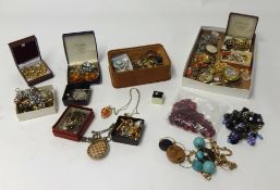 A large collection of various costume jewellery in four assorted boxes.