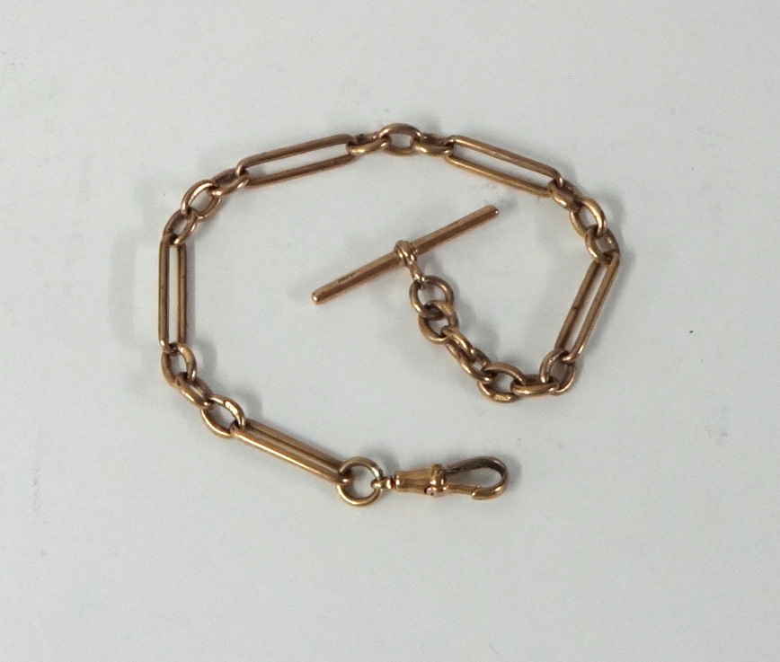 A 9ct gold watch chain with elongated links, length 23cm, weight 17.50g.