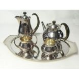 ERIC CLEMENTS (b1925, designer) A five piece Clements Pattern silver tea service, with plain