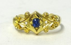 An 18ct gold diamond and sapphire ring, size O.
