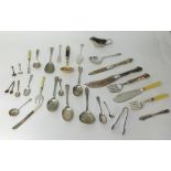 A Geo III  bright cut table spoon, silver sugar tongs, other silver objects and various silver