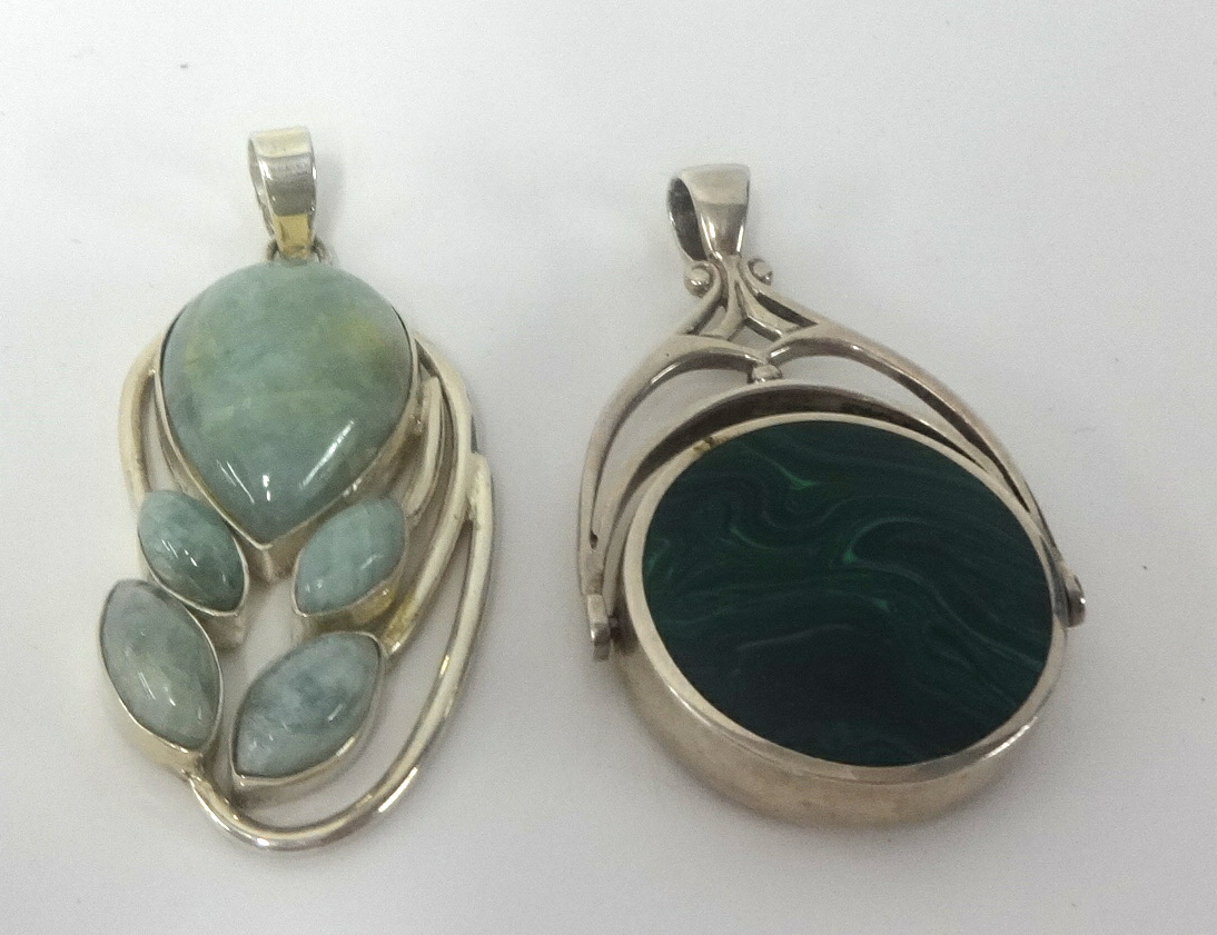A large silver and hardstone swivel fob and a silver and hardstone pendant (2)