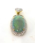 A fine 18ct gold opal and diamond cluster pendant surmounted with a diamond set heart, similar