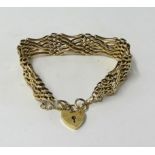 A 9ct gold gate bracelet, weight. 31g.