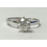 A diamond solitaire ring, approx. 1.00 carat set in a wide band, size N.