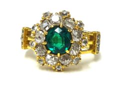 A good emerald and diamond set cluster ring, size L