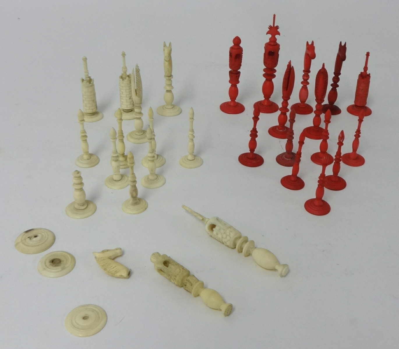 A mixed collection of part red and ivory antique chess set, two WWII medals, costume jewellery,