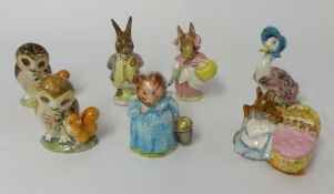 Seven Beatrix Potter figures
