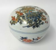 A 19th Century Japanese Imari rice bowl and cover