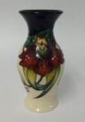 A Moorcroft pottery vase, Anna Lilly, height 20cm, 226/7