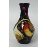 A Moorcroft pottery vase, Queens Choice, height 14cm , 372/5