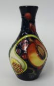 A Moorcroft pottery vase, Queens Choice, height 14cm , 372/5