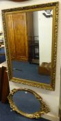 Two reproduction gilt framed mirrors.