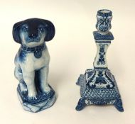 A Makkum porcelain dog group and a similar single candle stick (2)