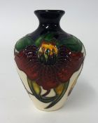 A Moorcroft pottery vase, Anna Lilly, height 10cm, 03/4