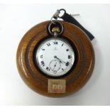 OMEGA silver open face keyless pocket watch and turned wood stand
