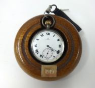 OMEGA silver open face keyless pocket watch and turned wood stand