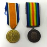 A Great War pair of medals awarded to 207994 PTE G .ASHMAN CAN INF, comprising Victory Medal and War