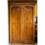 A good 19th century two door figured walnut wardrobe, with partly fitted interior, height 200cm.