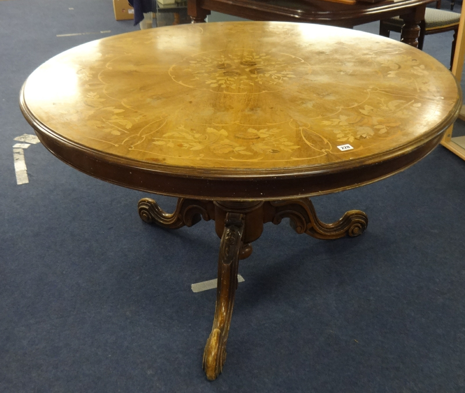 Victorian style circular breakfast table with a walnut and marquetry inlaid top on a carved tripod - Image 2 of 2