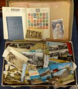 A large collection of general postcards (the contents of a suitcase)