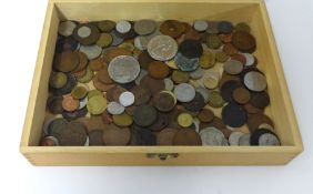A collection of various general foreign coins in wood box.