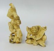 Two carved ivory figures a gargoyle and a baboon in night clothes, damaged