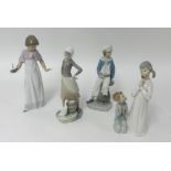 Four Lladro figures.